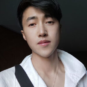 杨受成